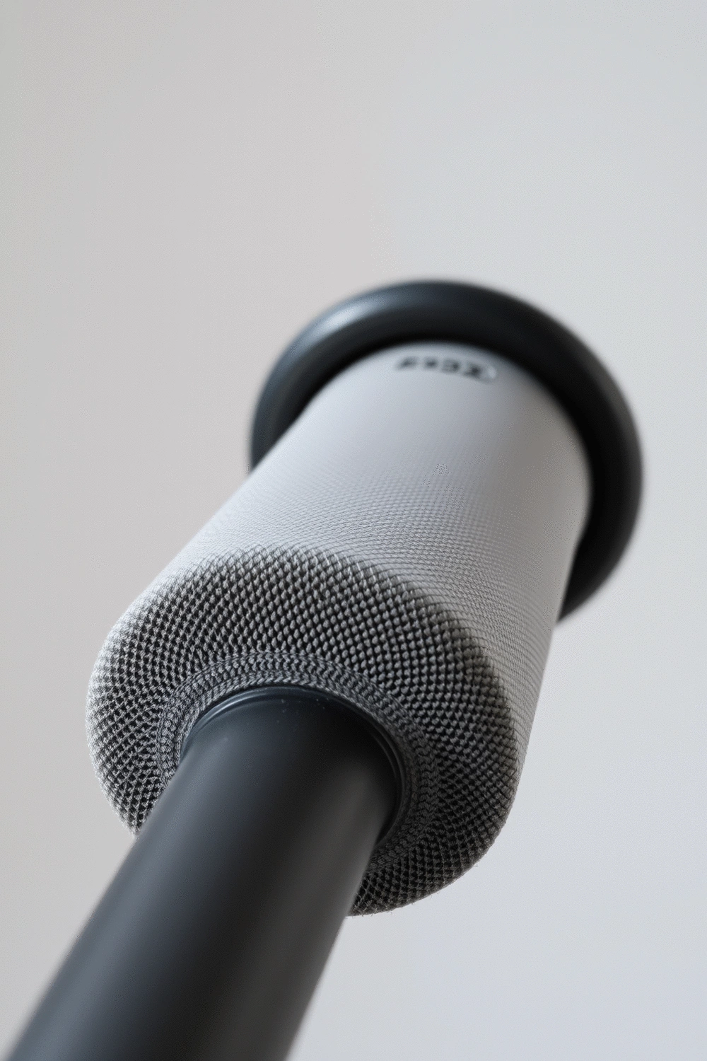 Close-up of a non-slip textured surface on a piece of exercise equipment